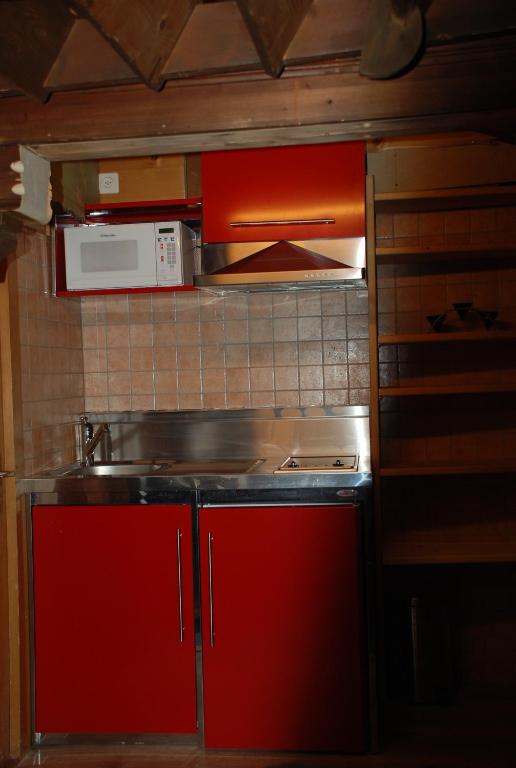 Köök või kööginurk majutusasutuses Le Vieux Chalet
