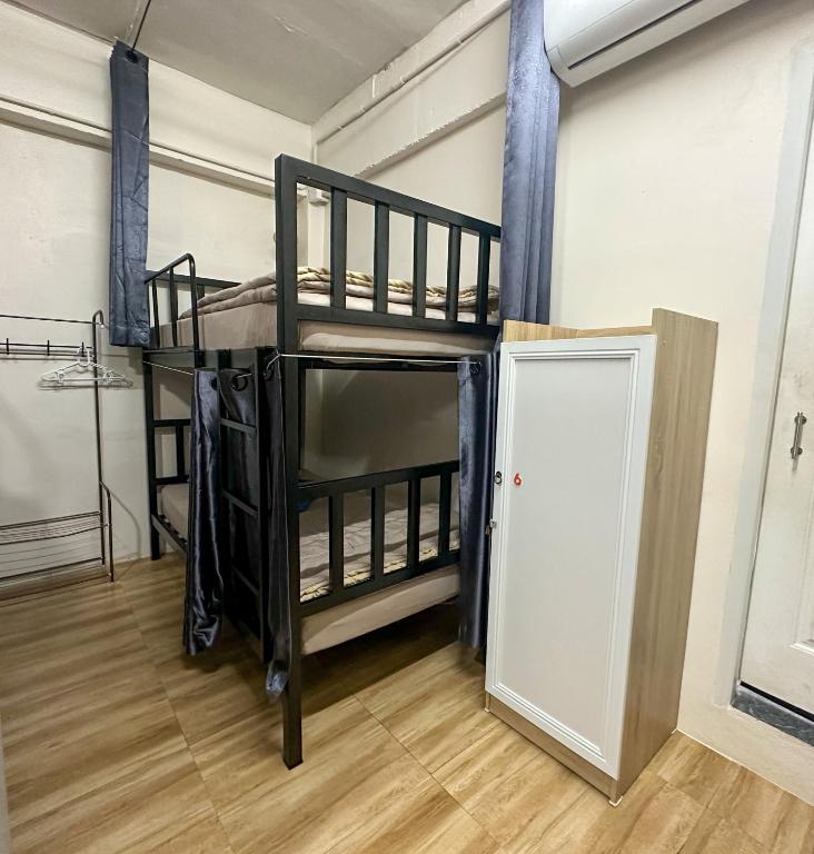Postel nebo postele na pokoji v ubytování Sweed Dee Hostel