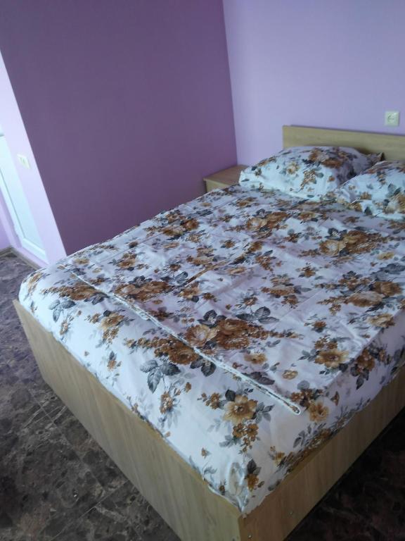 Postel nebo postele na pokoji v ubytování Отел Нана