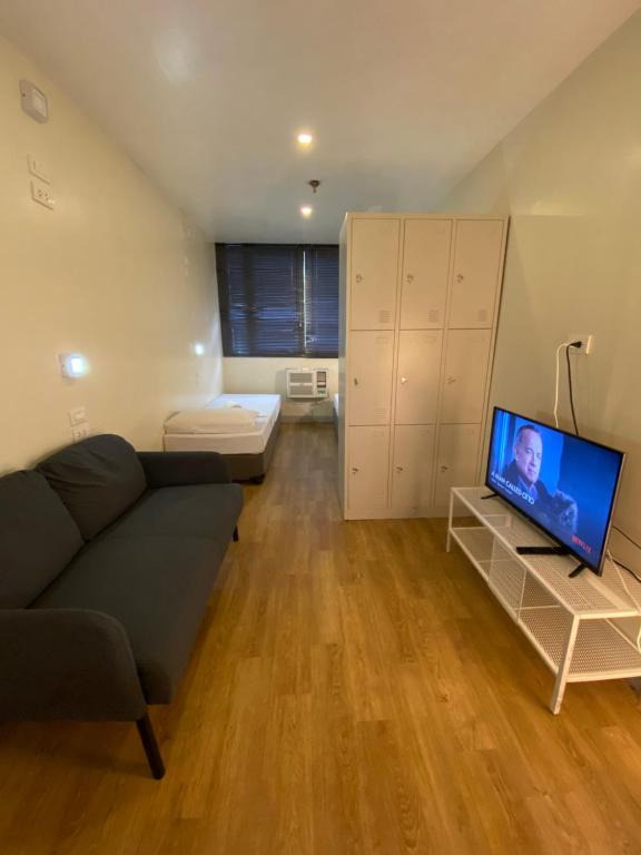 TV a/nebo společenská místnost v ubytování Burgos Hub Hostel