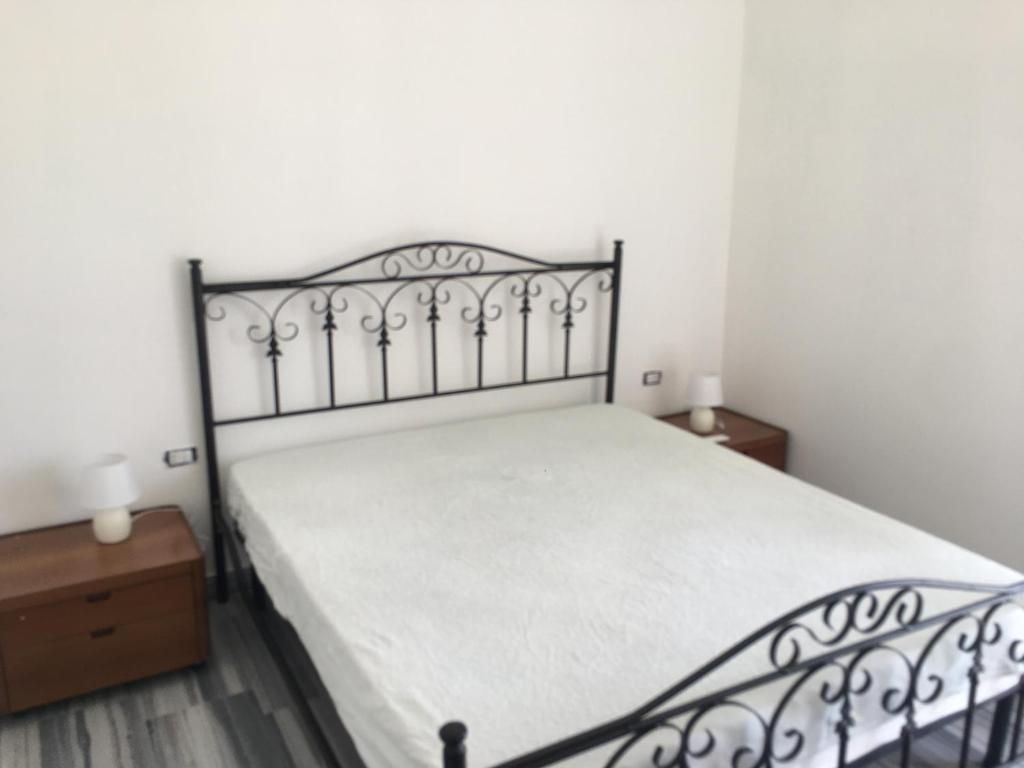 Postel nebo postele na pokoji v ubytování Residenza Rogiò