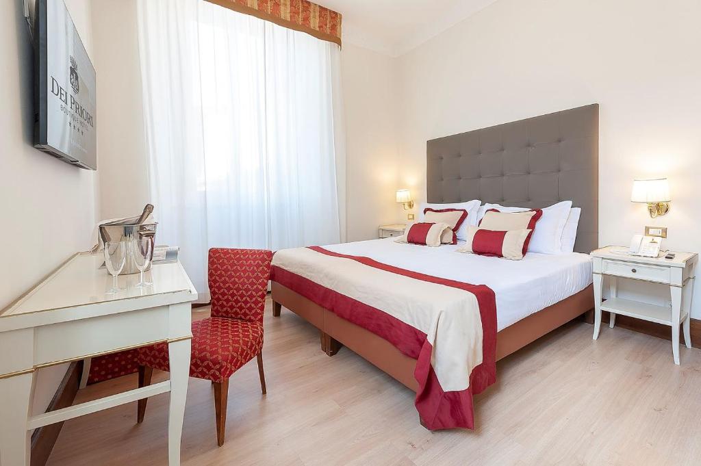 Posteľ alebo postele v izbe v ubytovaní Dei Priori Boutique Hotel