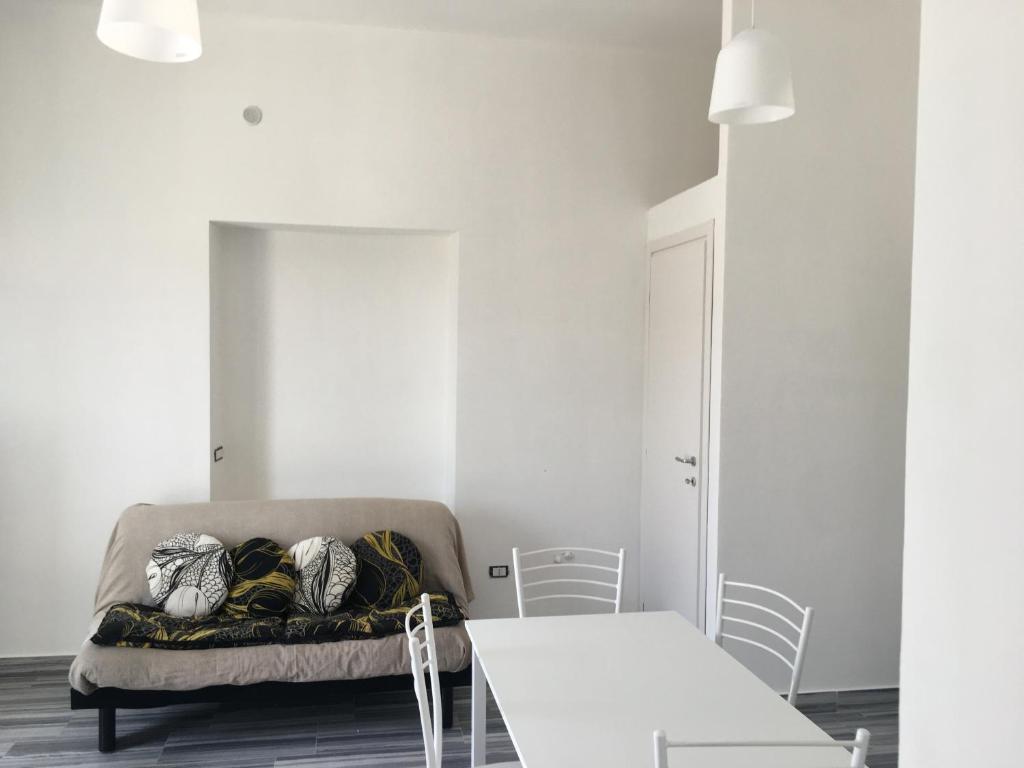 Postel nebo postele na pokoji v ubytování Residenza Rogiò
