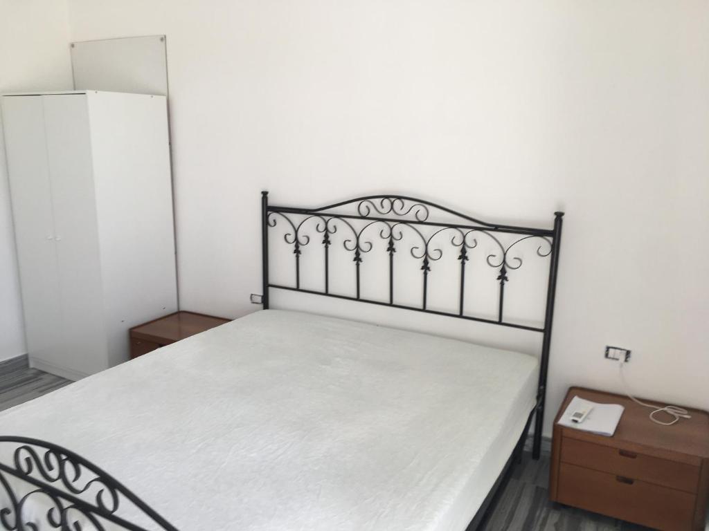 Postel nebo postele na pokoji v ubytování Residenza Rogiò