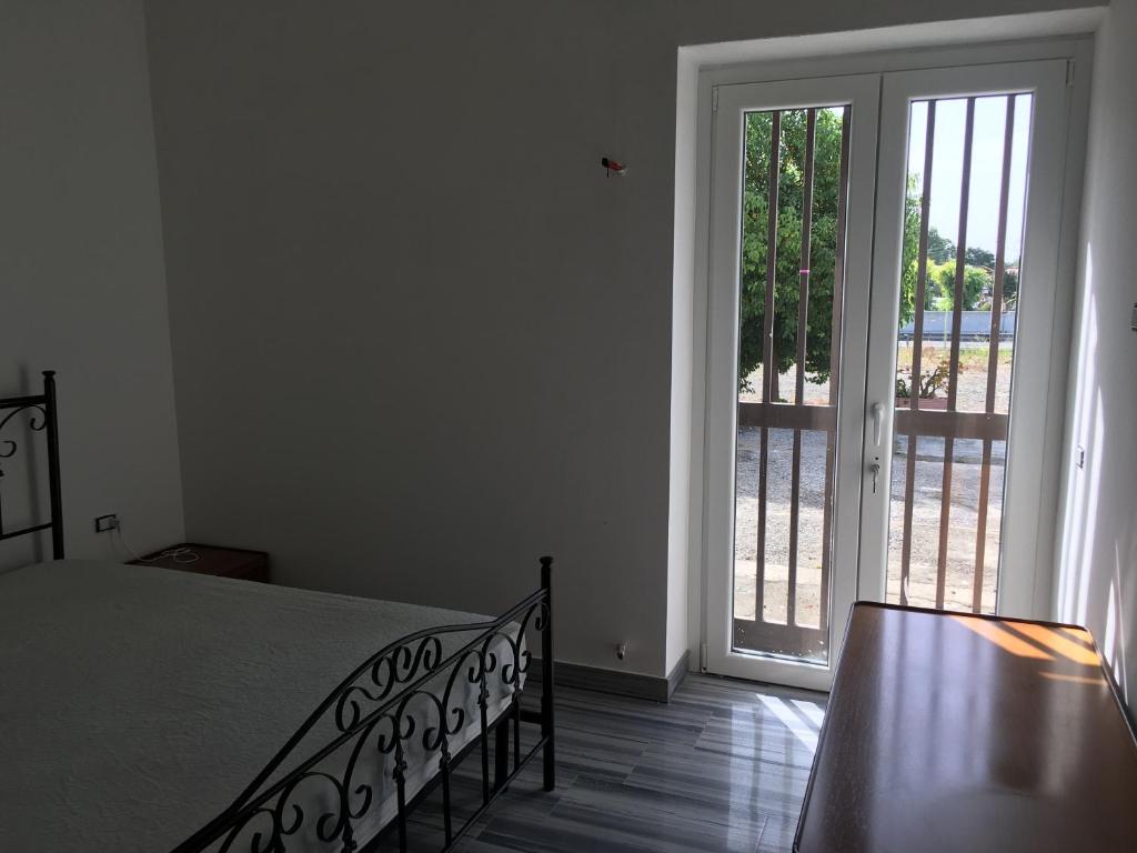 Postel nebo postele na pokoji v ubytování Residenza Rogiò