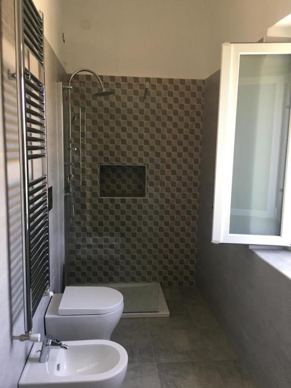 Koupelna v ubytování Residenza Rogiò