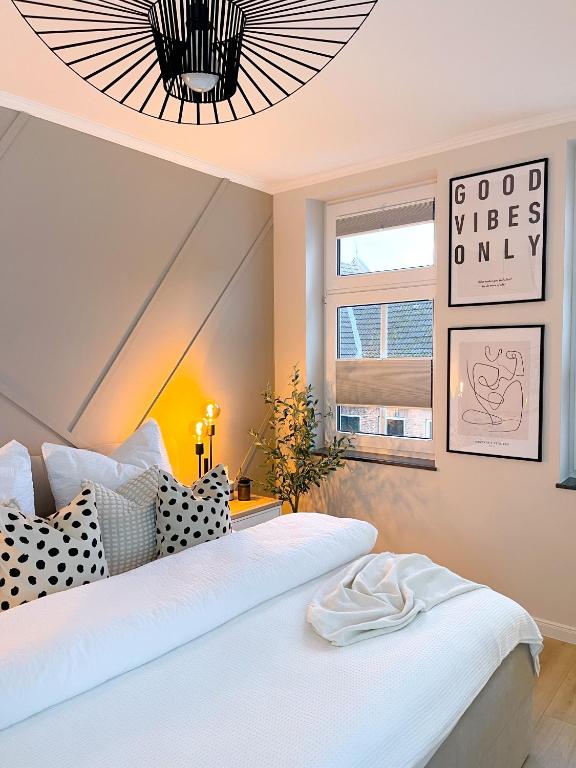 Postel nebo postele na pokoji v ubytování Ferienwohnung Domizil am Delft II Emden