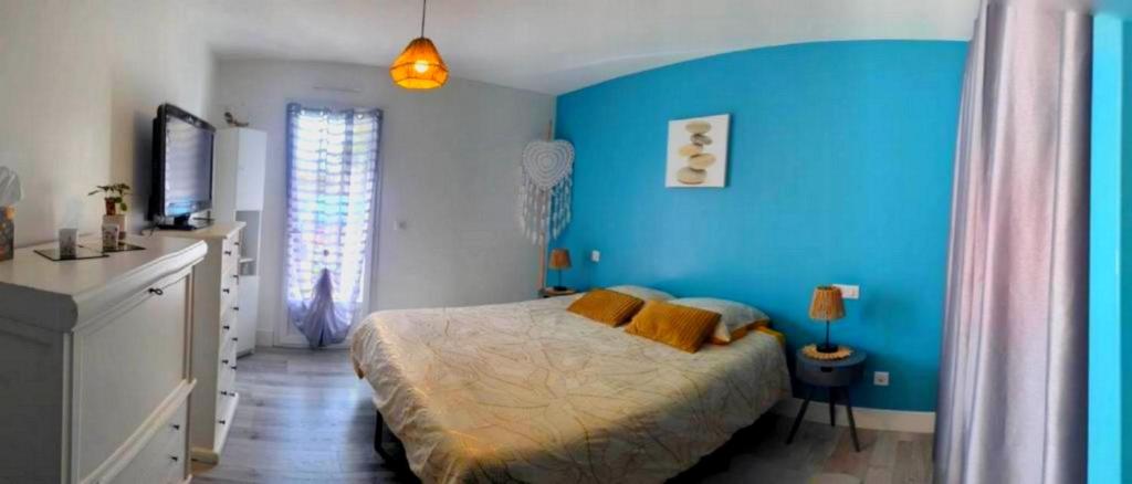 Postel nebo postele na pokoji v ubytování Landes Conviviales, CHAMBRES chez l'habitante, Laëtitia !