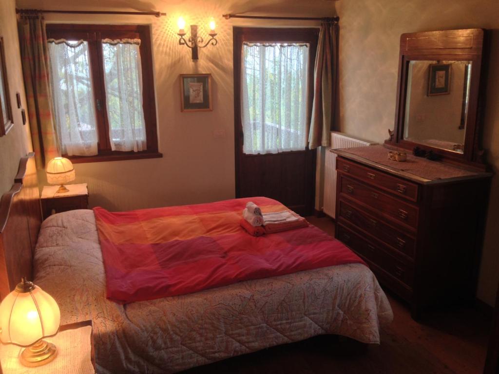 Letto o letti in una camera di Agriturismo Dagai