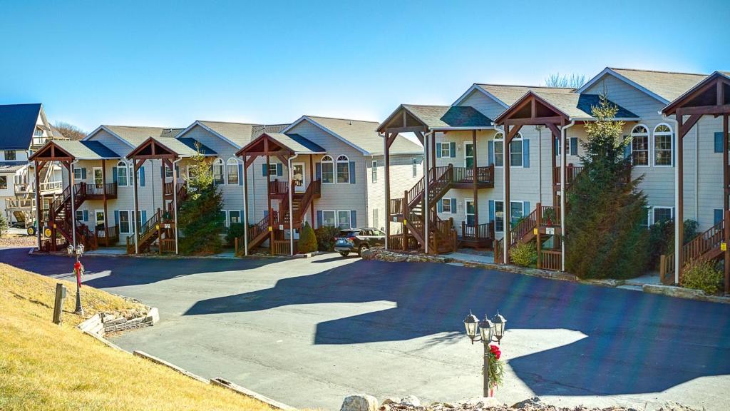 a large apartment complex with a large driveway at Klonteska Condominiums By VCI Real Estate Services in Beech Mountain