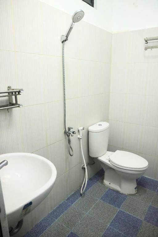 Koupelna v ubytování Hotel Bhakti Syariah