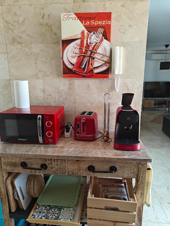 A kitchen or kitchenette at Casa del Sol Naciente - heated pools - wifi - UK,BE,NL,FR TV channels