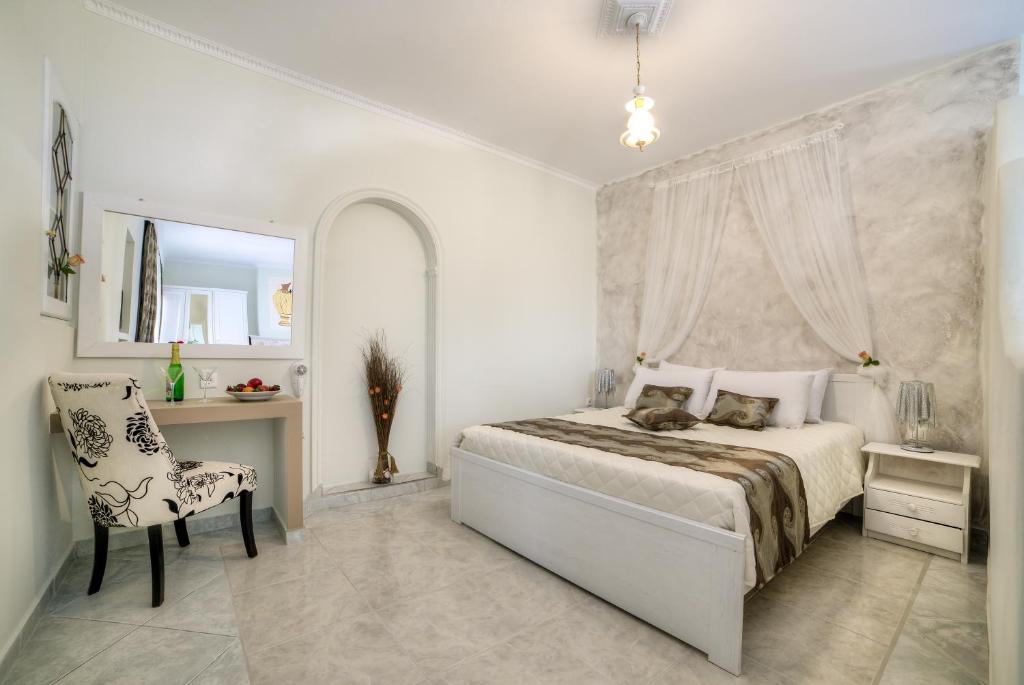 Postel nebo postele na pokoji v ubytování Pantheon Hotel