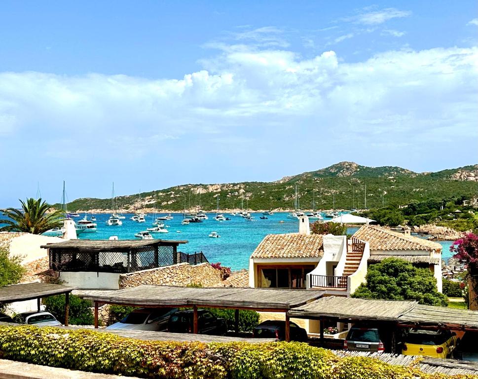 a view of a harbor with boats in the water at Only One Piccolo Pevero in Arzachena