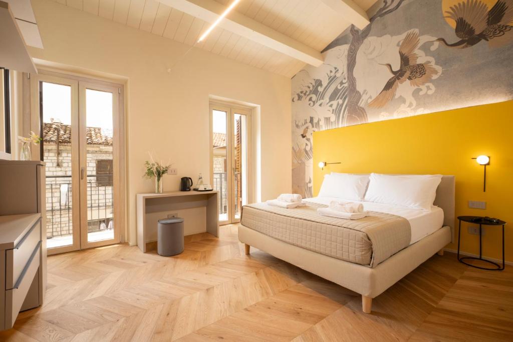 Postel nebo postele na pokoji v ubytování Marna Relais