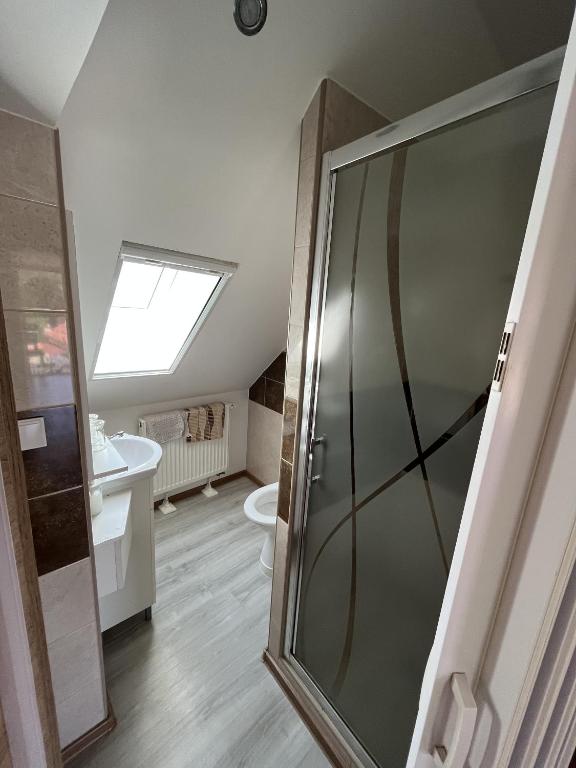 Postel nebo postele na pokoji v ubytování SUNNY Apartman