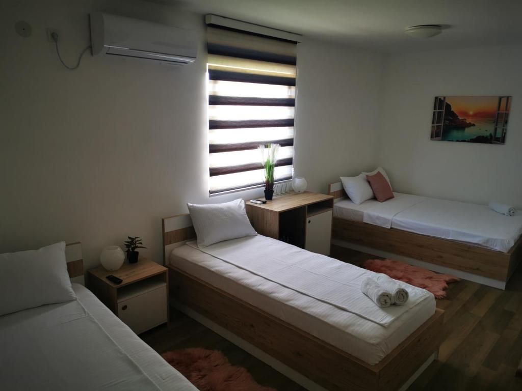 Postel nebo postele na pokoji v ubytování Villa Boho Cherga