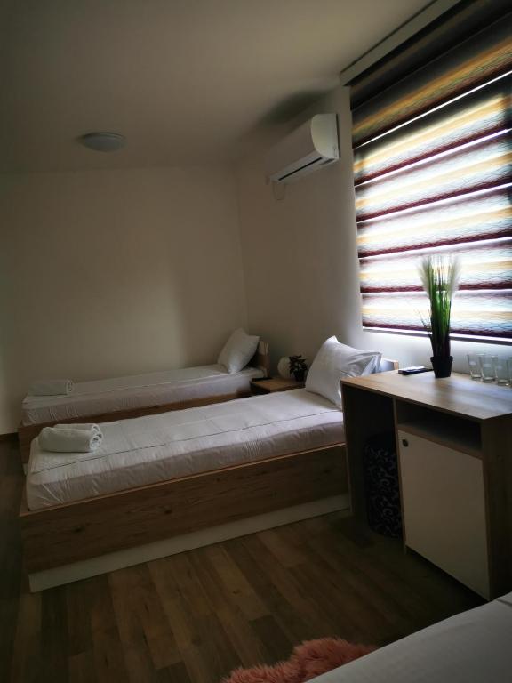 Postel nebo postele na pokoji v ubytování Villa Boho Cherga