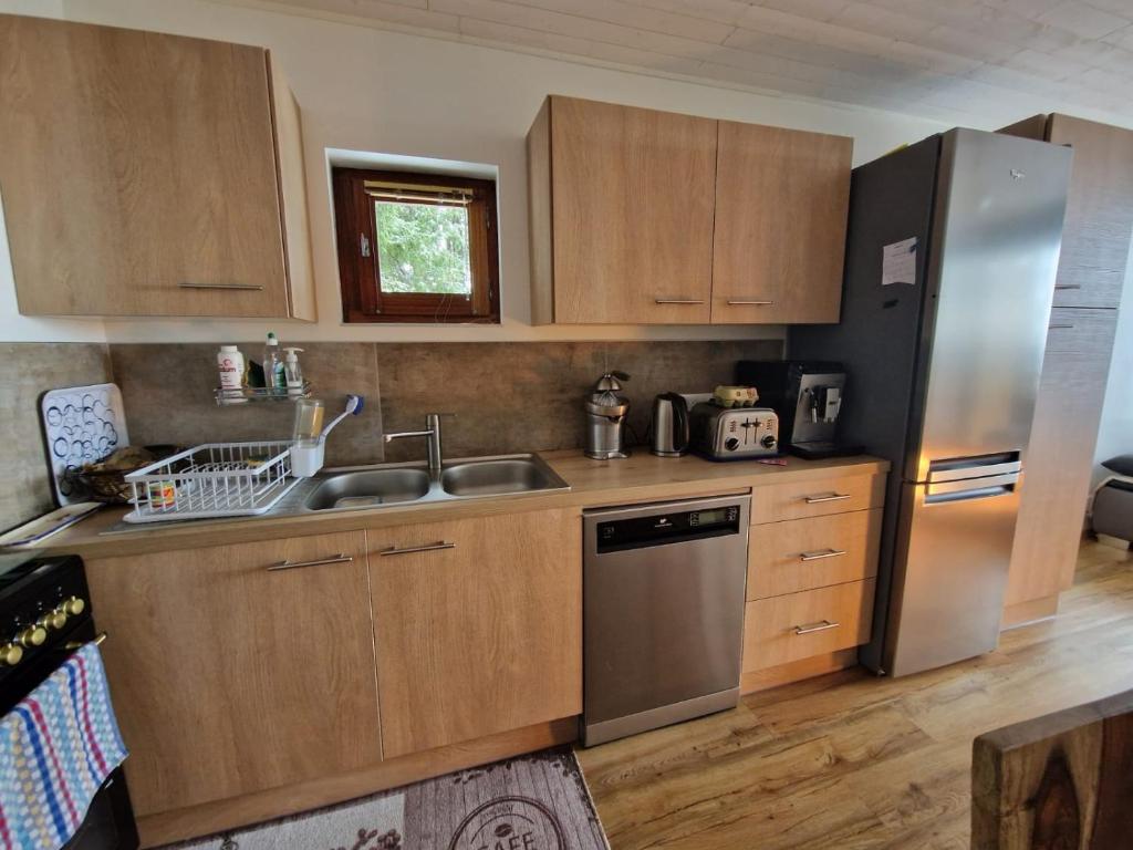 Kuchyň nebo kuchyňský kout v ubytování Appartement en résidence