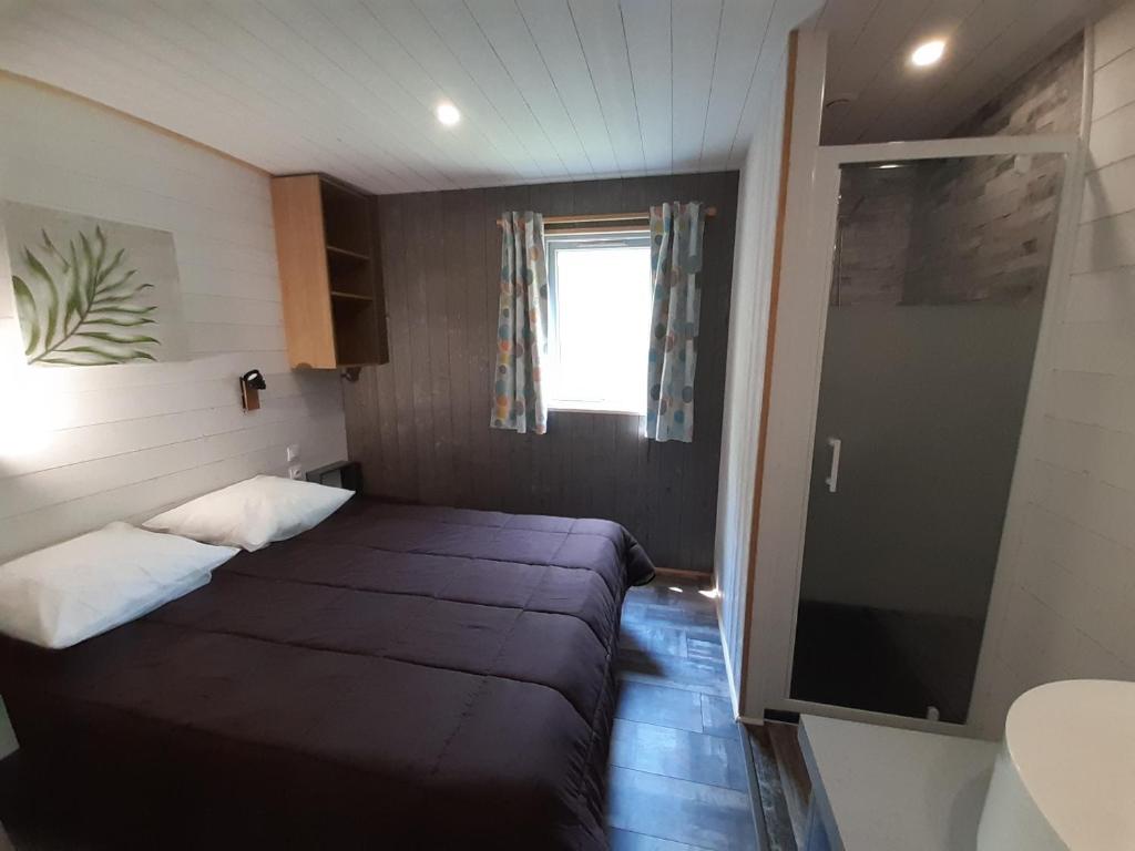 Postel nebo postele na pokoji v ubytování Camping la Venise Verte