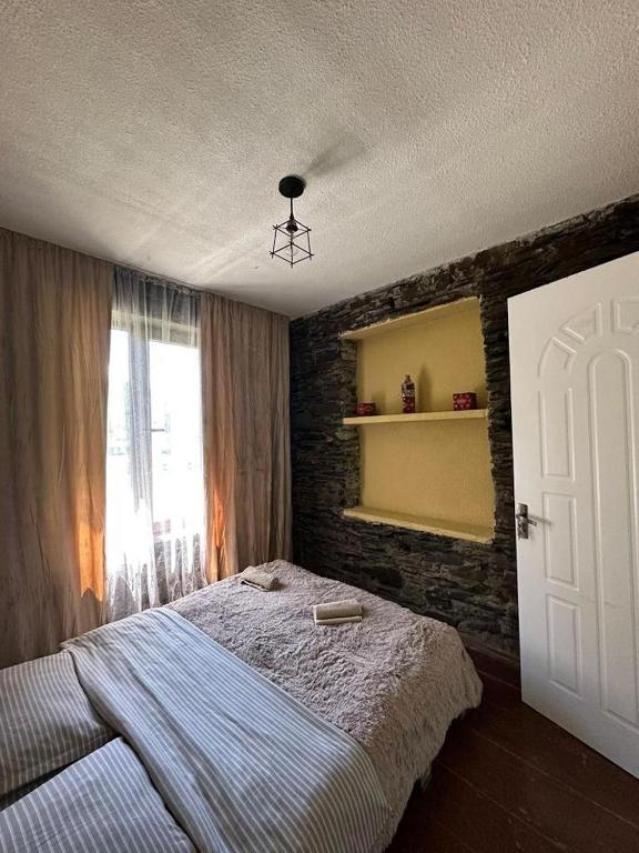 Postel nebo postele na pokoji v ubytování Nanila