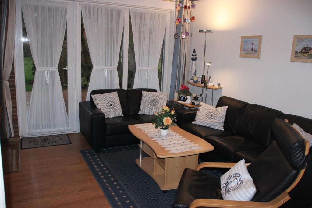 Posezení v ubytování Ferienhaus Besken