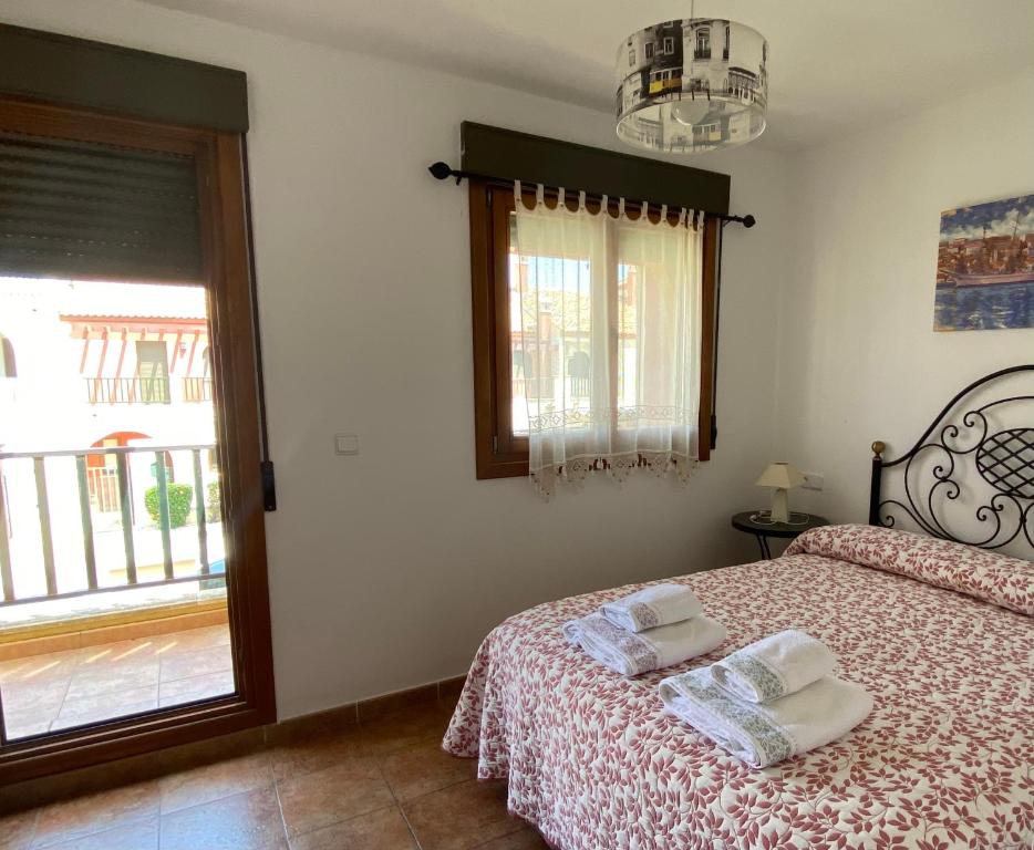 Posteľ alebo postele v izbe v ubytovaní ADOSADO CON VISTAS, RELAJATE Y DISFRUTA