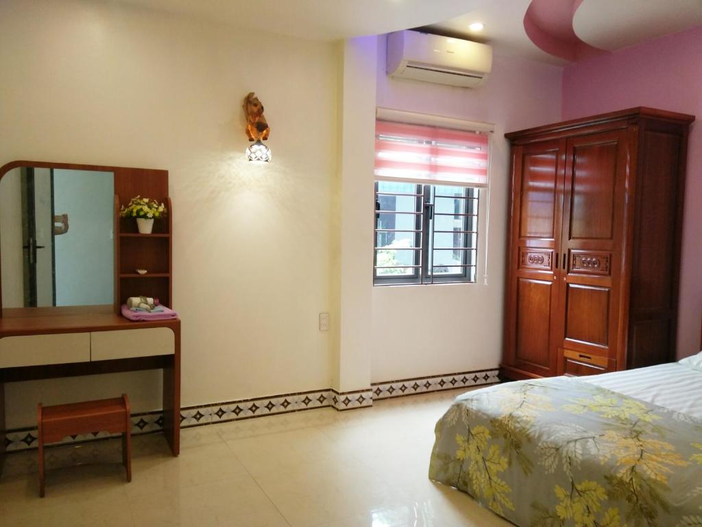 Postel nebo postele na pokoji v ubytování Rustic Homestay - Phòng nghỉ giá rẻ