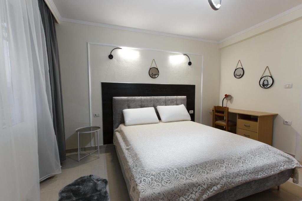 Postel nebo postele na pokoji v ubytování Martin Villa Gjirokaster