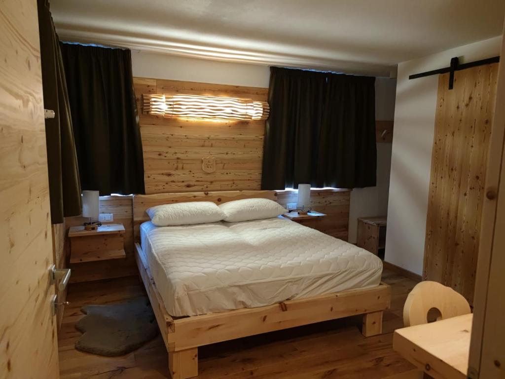 Ένα ή περισσότερα κρεβάτια σε δωμάτιο στο La Casa di BeSe