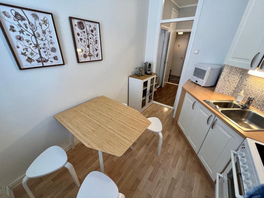Kuchyň nebo kuchyňský kout v ubytování Hogland Apartments - 3