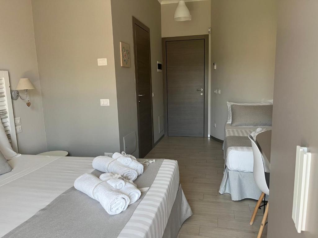 Postel nebo postele na pokoji v ubytování B&B L’ALTRAMURGIA