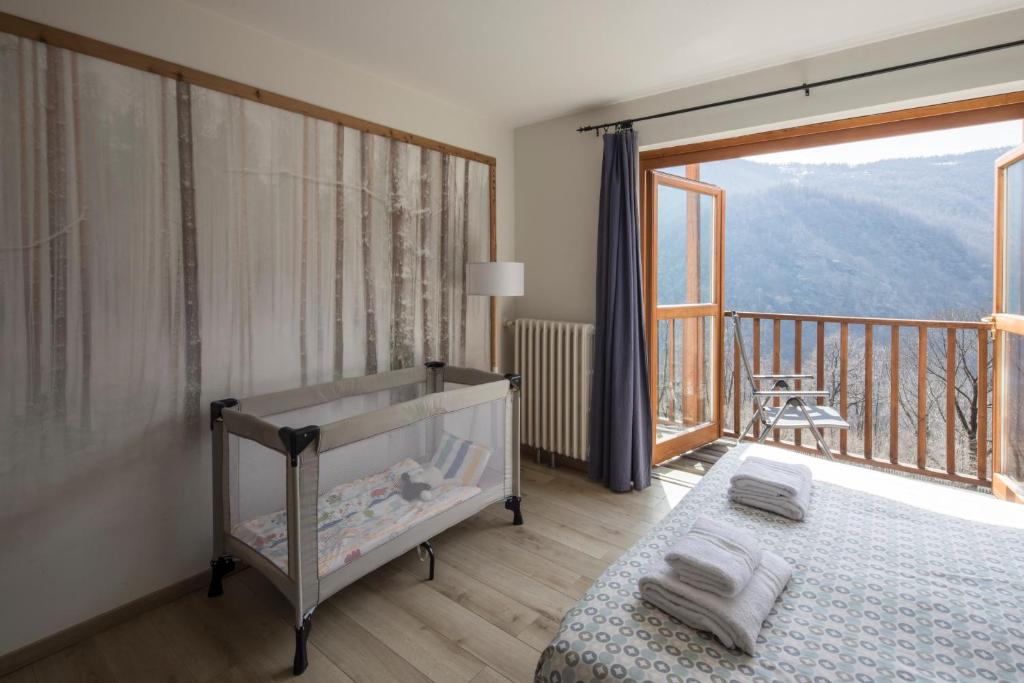 Postel nebo postele na pokoji v ubytování Rifugio Galaberna