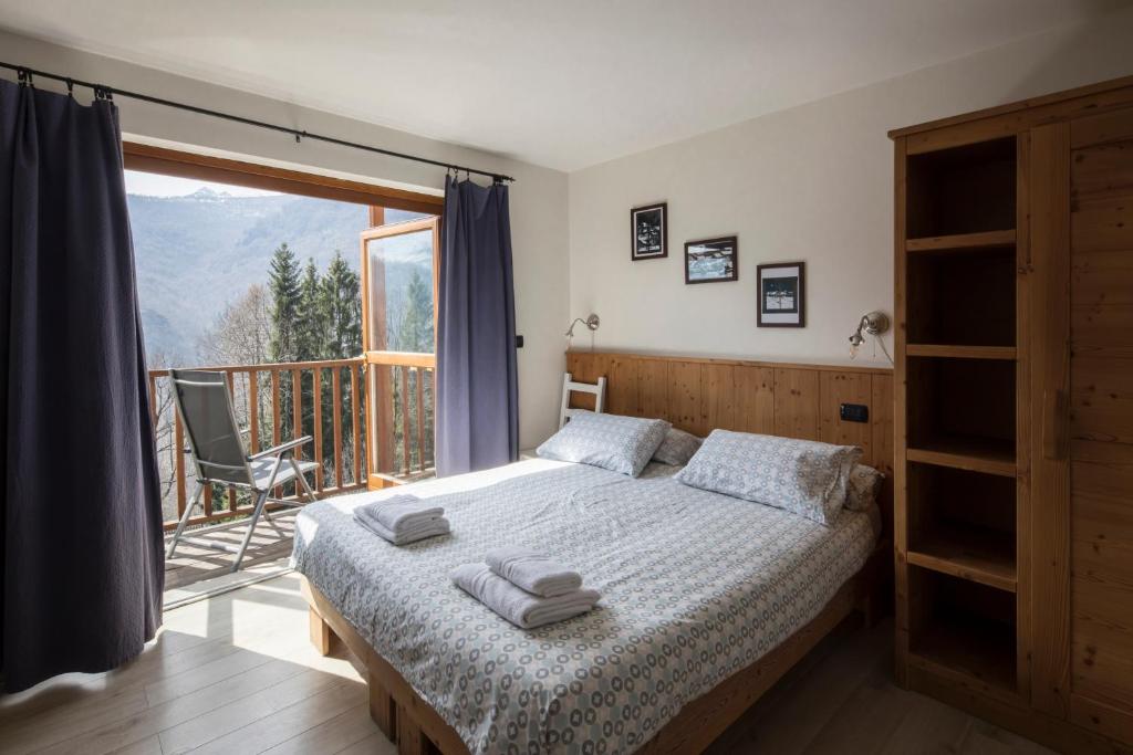 Postel nebo postele na pokoji v ubytování Rifugio Galaberna
