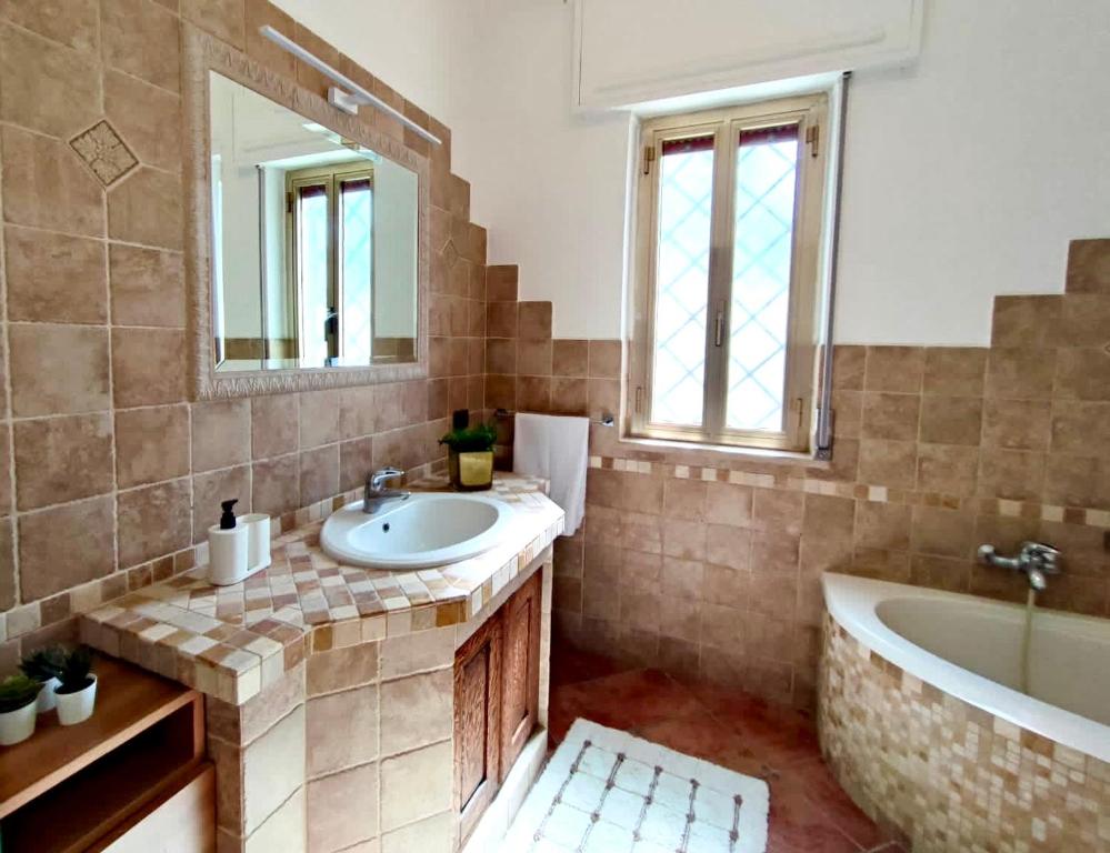 Ванная комната в Villa singola Amanda - 500m dal mare