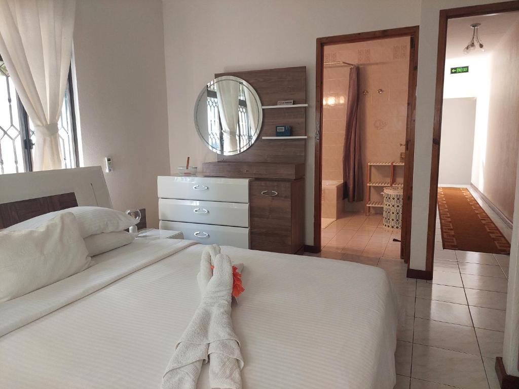 Postel nebo postele na pokoji v ubytování Reef Hills Residence