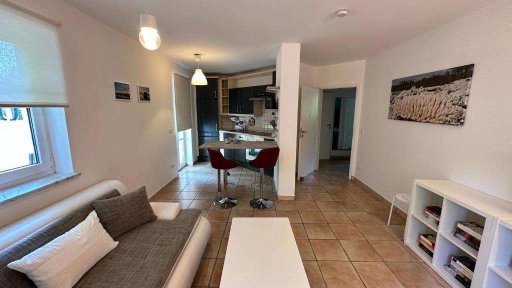 Χώρος καθιστικού στο Ferienwohnung in Oberschondorf mit Terasse