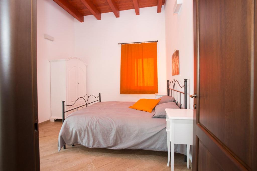 Postel nebo postele na pokoji v ubytování Masseria Stella