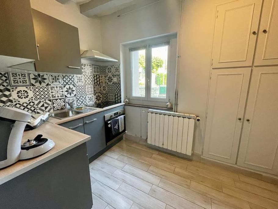 Kuchyň nebo kuchyňský kout v ubytování Maison