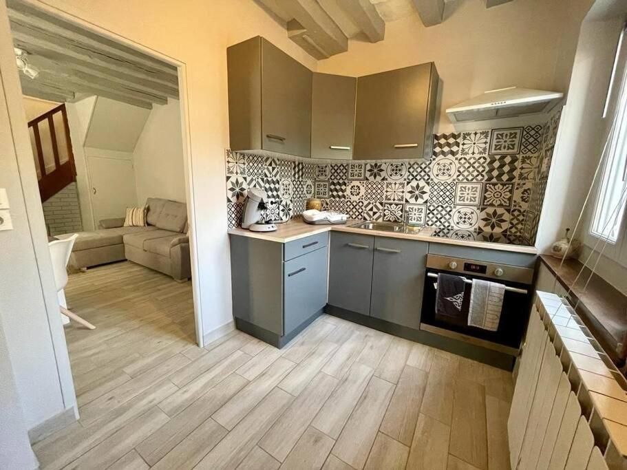 Kuchyň nebo kuchyňský kout v ubytování Maison