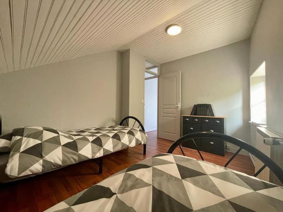 Postel nebo postele na pokoji v ubytování Maison