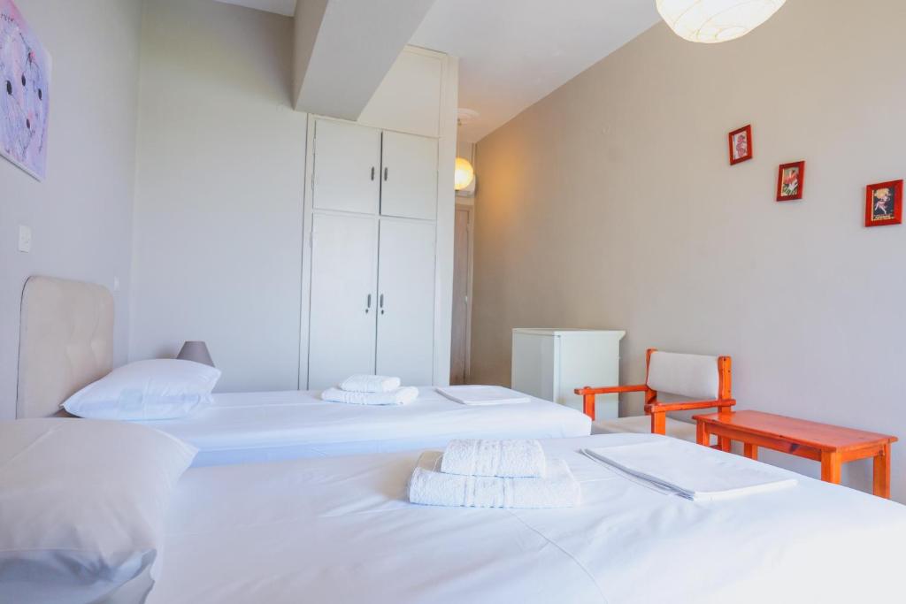 Postel nebo postele na pokoji v ubytování Hotel Korfos - Ξενοδοχείο Κόρφος Renovated
