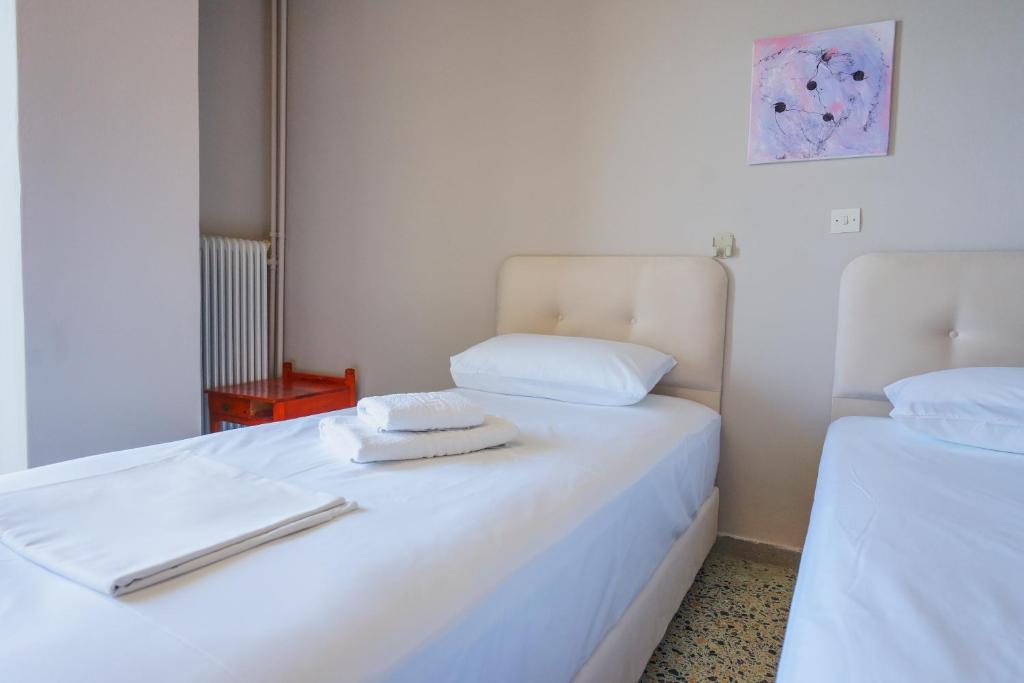 Postel nebo postele na pokoji v ubytování Hotel Korfos - Ξενοδοχείο Κόρφος Renovated