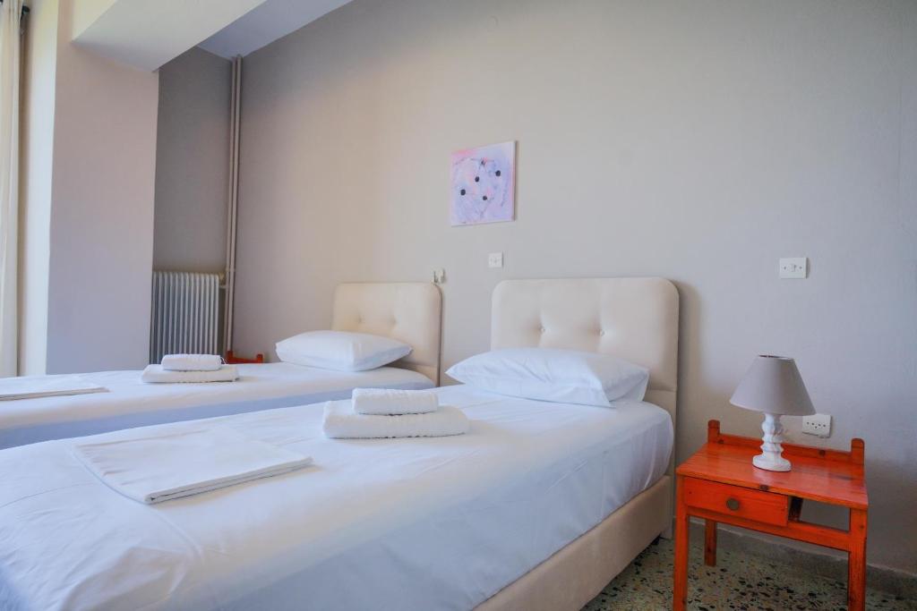 Postel nebo postele na pokoji v ubytování Hotel Korfos - Ξενοδοχείο Κόρφος Renovated