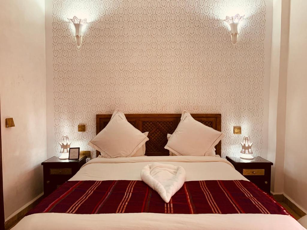 Postel nebo postele na pokoji v ubytování Palais Aix Kabaj &Spa