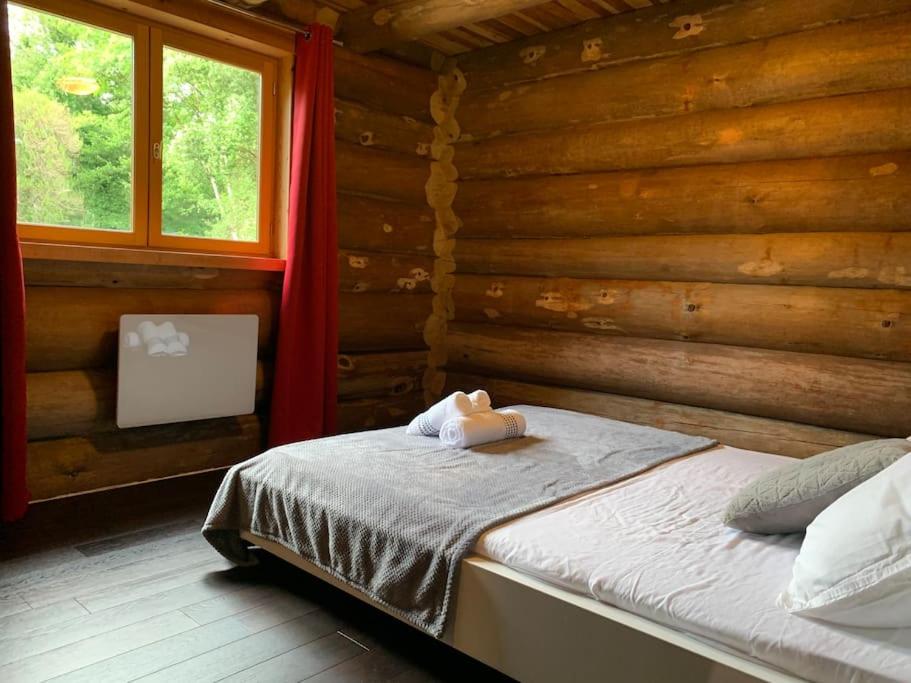 Postel nebo postele na pokoji v ubytování Hébergement d'exception à Zonza