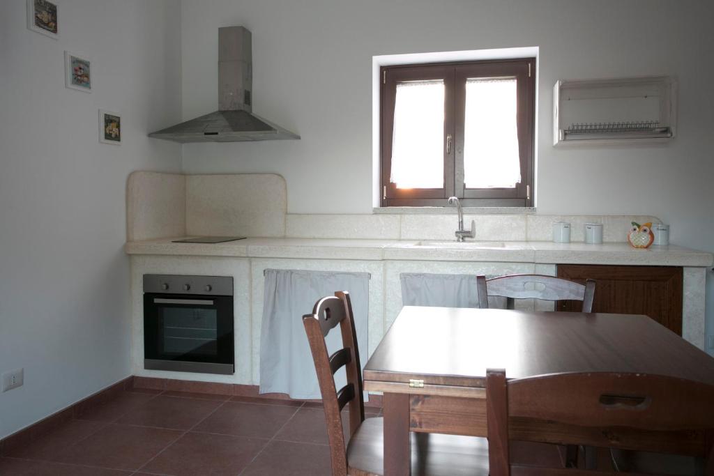 Kuchyň nebo kuchyňský kout v ubytování Masseria Stella