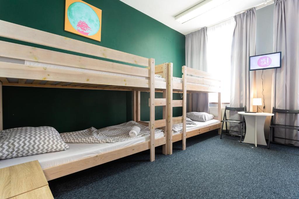 Postel nebo postele na pokoji v ubytování Moon Hostel Gdańsk