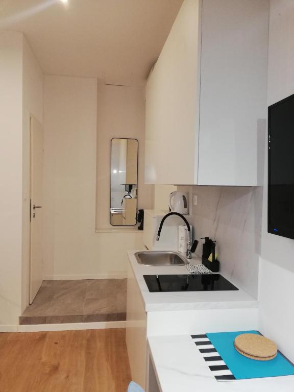 Kuchyň nebo kuchyňský kout v ubytování Apartments Simple Teslina