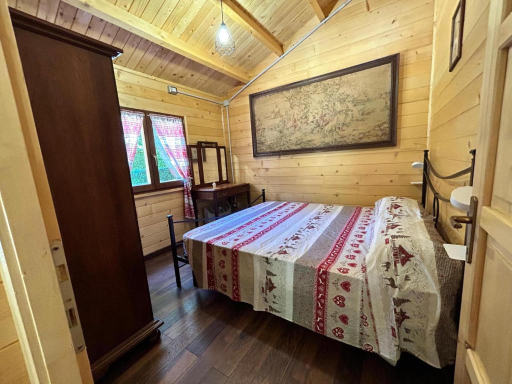 Letto o letti in una camera di CARPE DIEM RETAFANI Roger's house